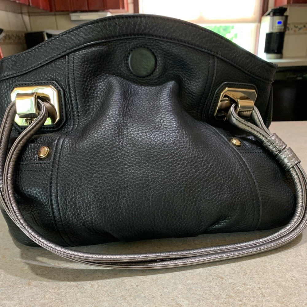 B. Makowsky purse.  Black with silver straps and gold hardware.